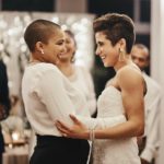 Shot of a newlywed couple dancing while being surrounded by their guests