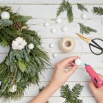 Top view of traditional handmade diy Christmas wreath made with natural elements